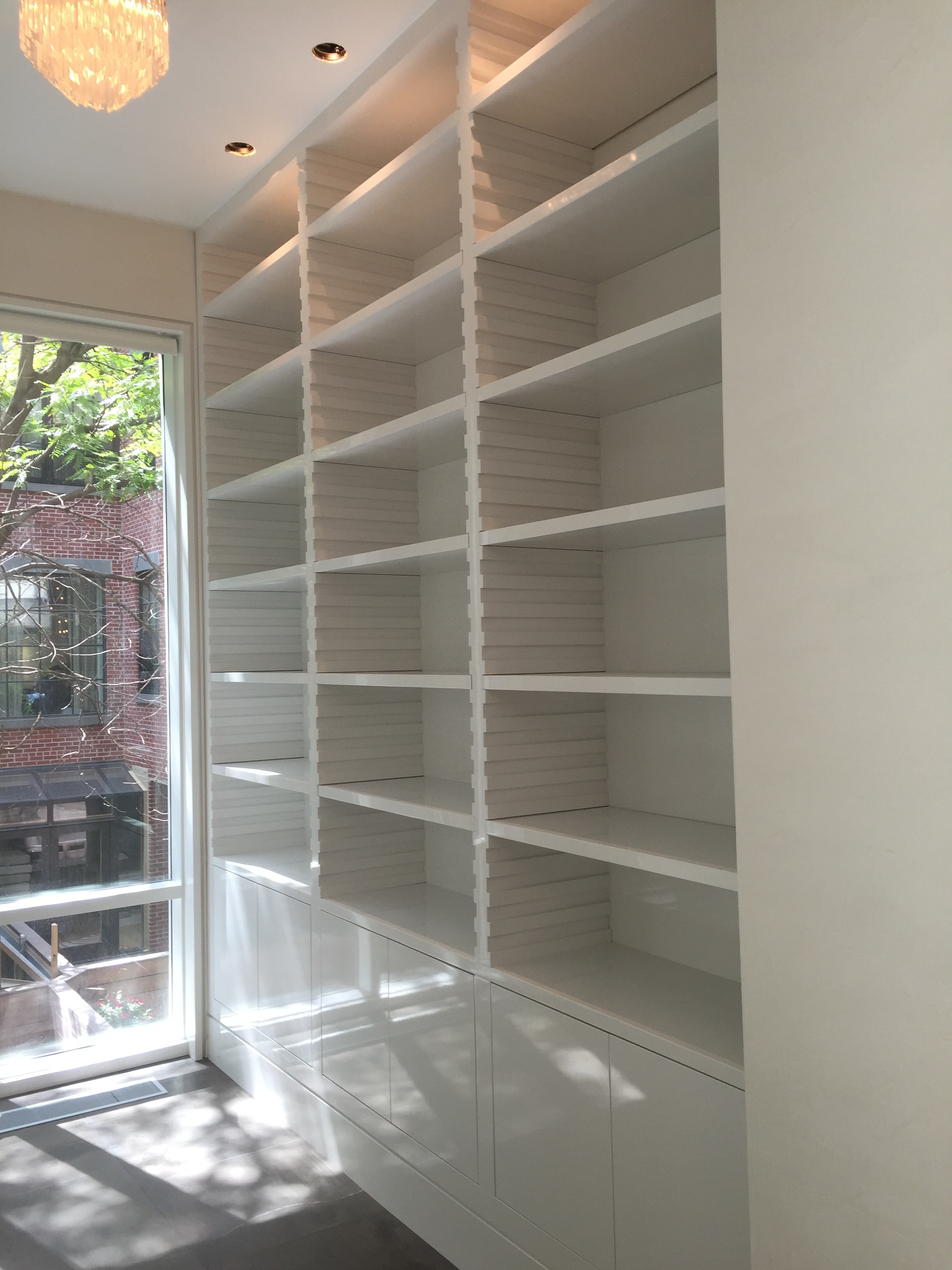 Modern white built-in shelving unit